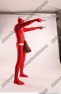 JOEL_ADAMSON CHRISTMAS VILLAIN WITH TWO GUNS